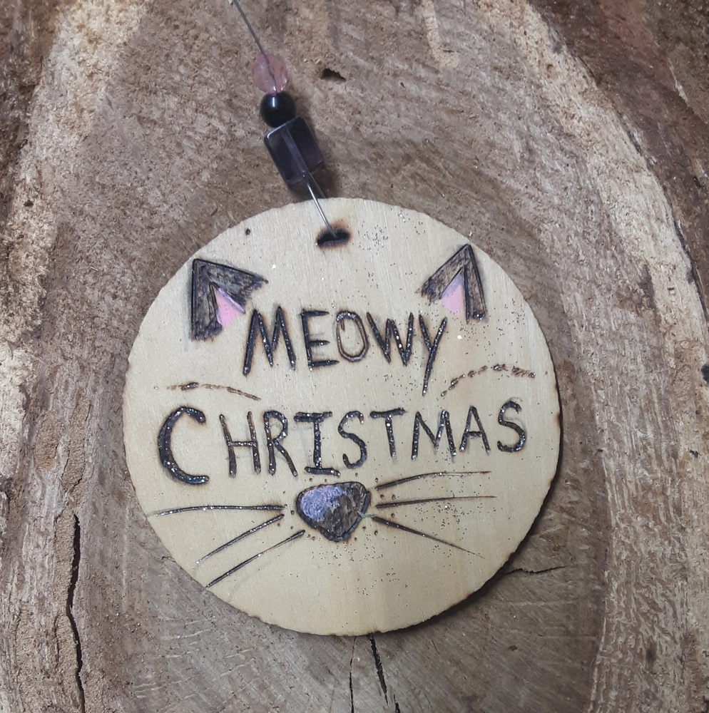 Woodburnt painted ornament